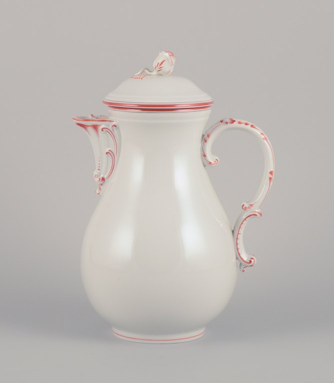 Meissen, Germany. Large coffee pot decorated with coral red and gold-colored trim. Art Deco.