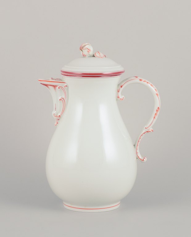 Meissen, Germany. Coffee pot decorated with coral red and gold-colored trim. Art Deco.