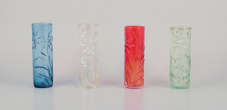 Fåglavik, Sweden. A set of four art glass vases with flower motifs. Handmade and in various colors.