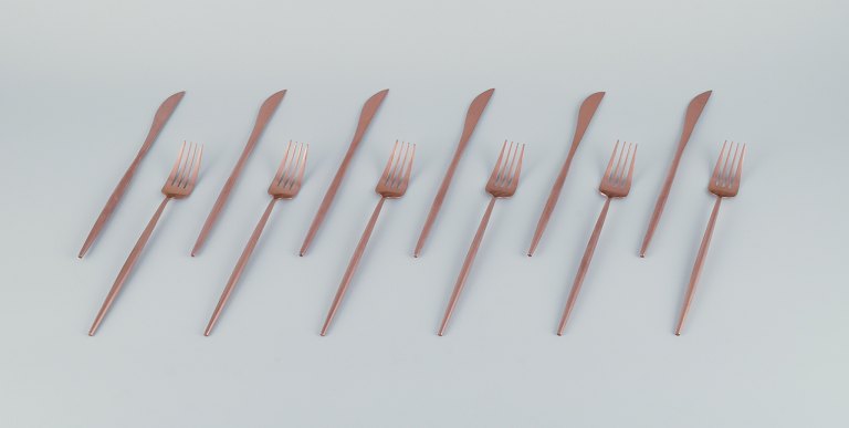 A six-person modernist dinner flatware set in brass, consisting of six dinner knives and six dinner forks.Swedish design.