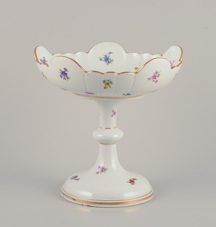 Meissen, Germany. Large porcelain centerpiece.Hand-painted with polychrome floral motifs.