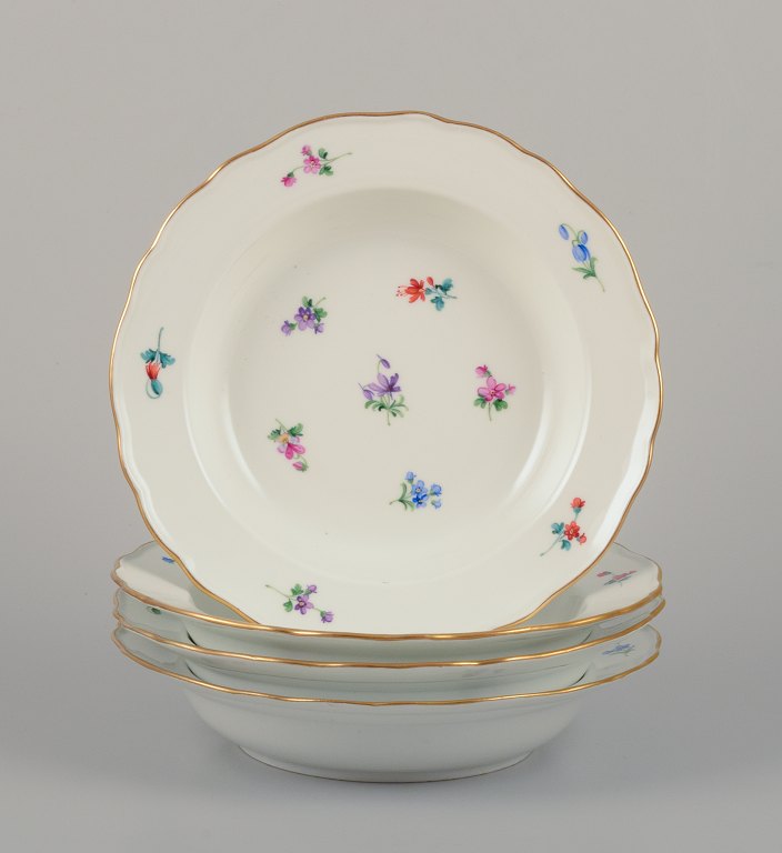 Meissen, Germany.A set of four deep plates in porcelain.
