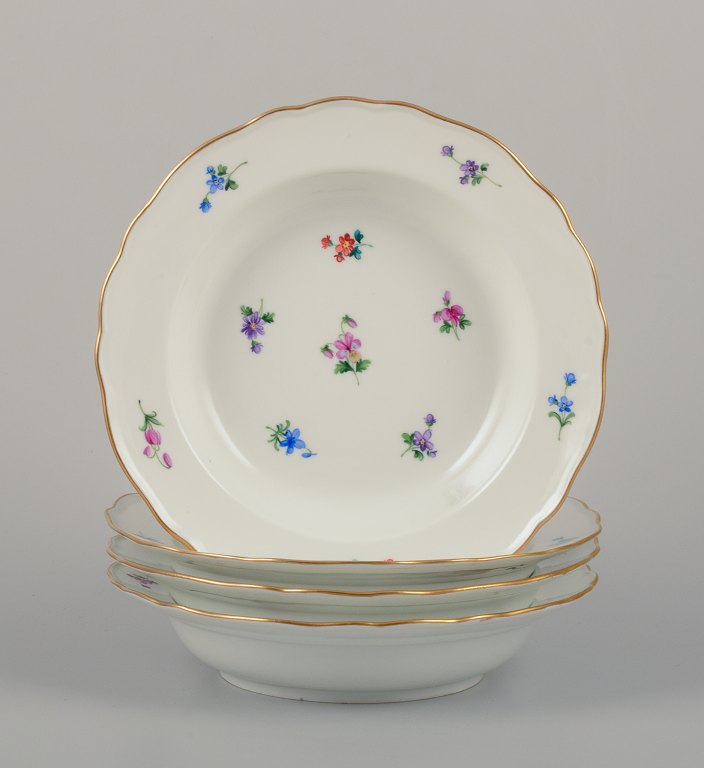 Meissen, Germany.A set of four deep plates in porcelain.
