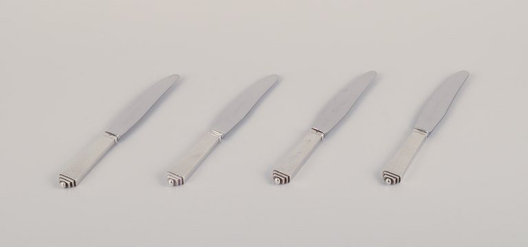 Georg Jensen Pyramid.Four short-handled lunch knives in sterling silver.