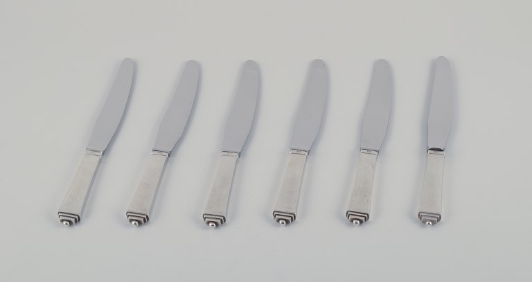 Georg Jensen Pyramid, a set of six short-handled dinner knives in sterling silver.