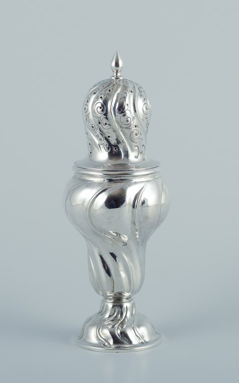 An antique European sugar caster in 830 silver.