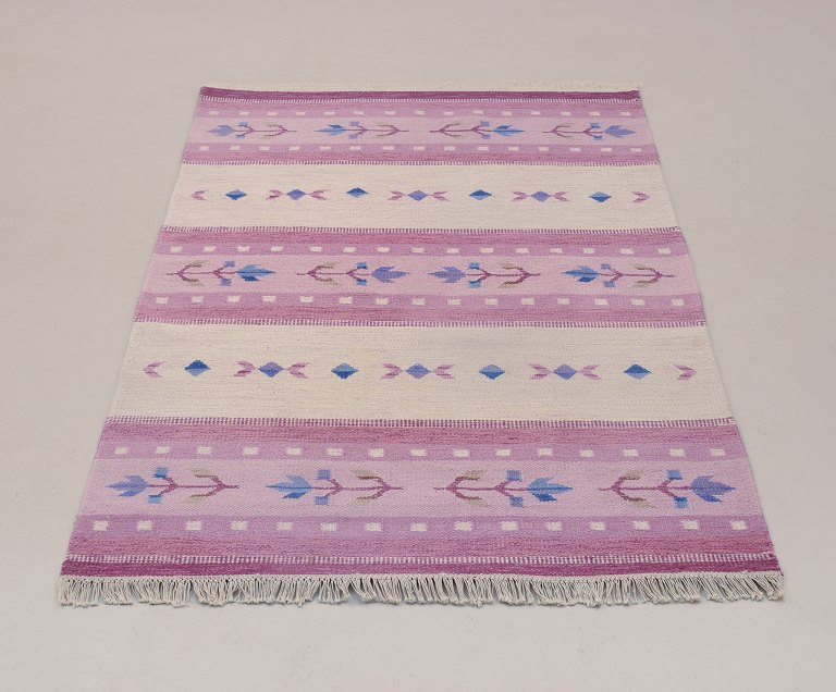 Swedish textile designer.Handwoven carpet in pure wool. Rölakan technique.