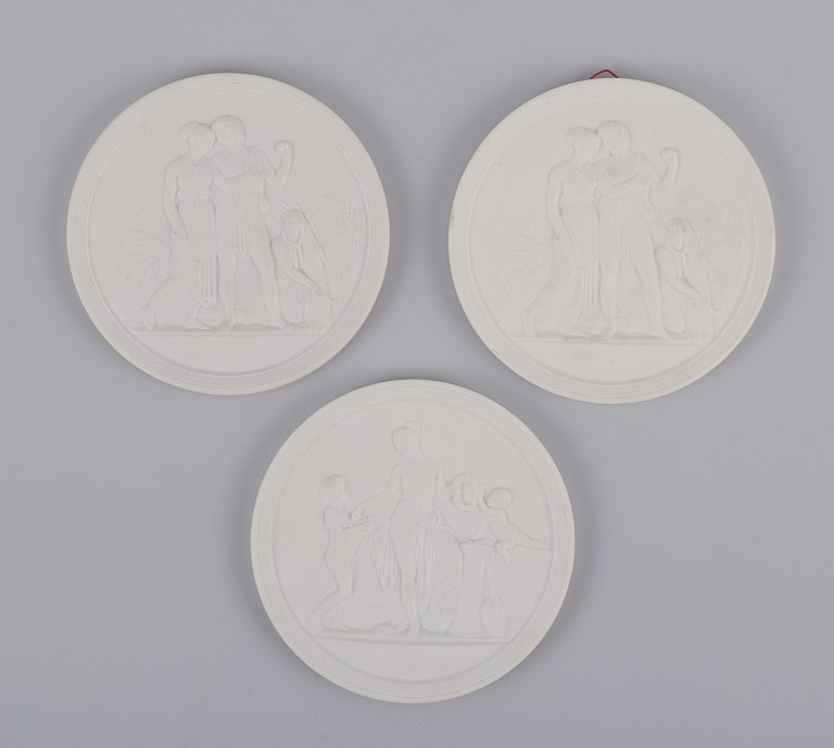 Royal Copenhagen.Three biscuit wall reliefs, after motifs by Bertil Thorvaldesen.