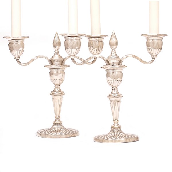 Pair of sterlingsilver candelabra by Svend Toxværd, Copenhagen, for one or two 
candles. H: 25cm