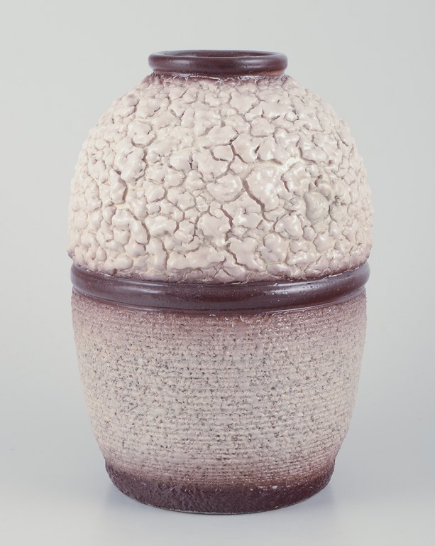 French ceramicist.Ceramic vase. Lava glaze in light and brown colours.