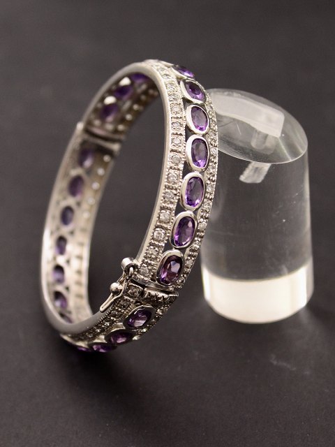 Sterling silver bangle with amethysts