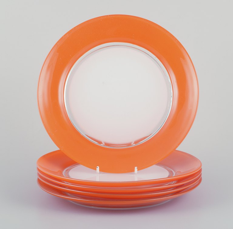 Duralex, France.A set of five art glass plates in orange and white glass.