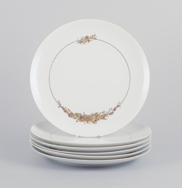 Bjørn Wiinblad for Rosenthal Studioline.A set of six "Romanze" dinner plates in porcelain.