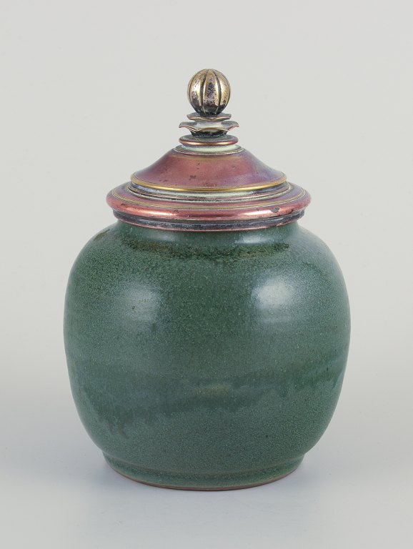 Unique lidded ceramic jar.