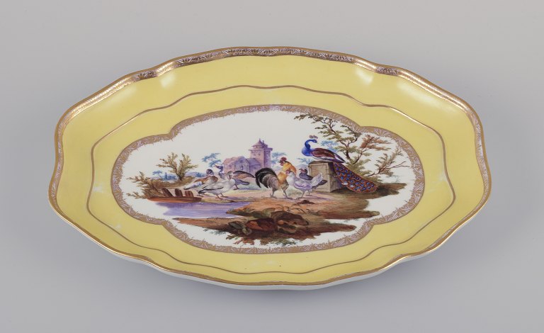 Antique Meissen tray made of porcelain.Hand-painted with a motif of birds in a park landscape.