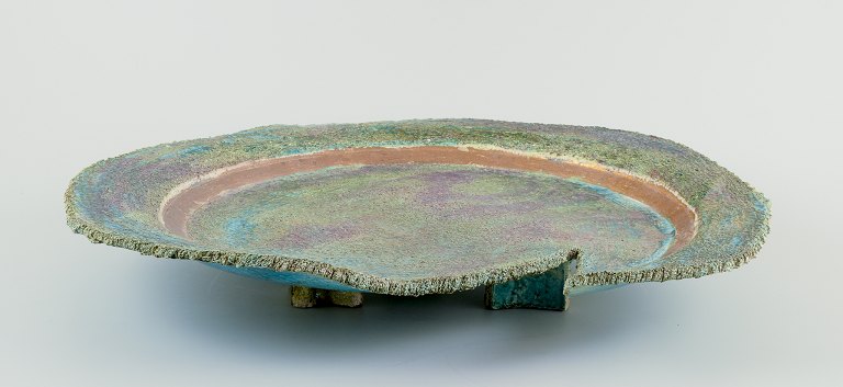 Édouard Massier (1856–1920), French ceramicist.
Colossal unique dish of glazed ceramic, on three feet.