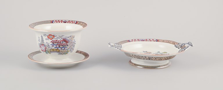 Rörstrand, Sweden. ‘Japan’ sauce bowl on foot and centerpiece with two handles. Faience.