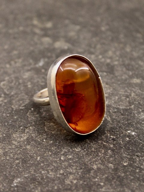 Sterling silver ring with amber