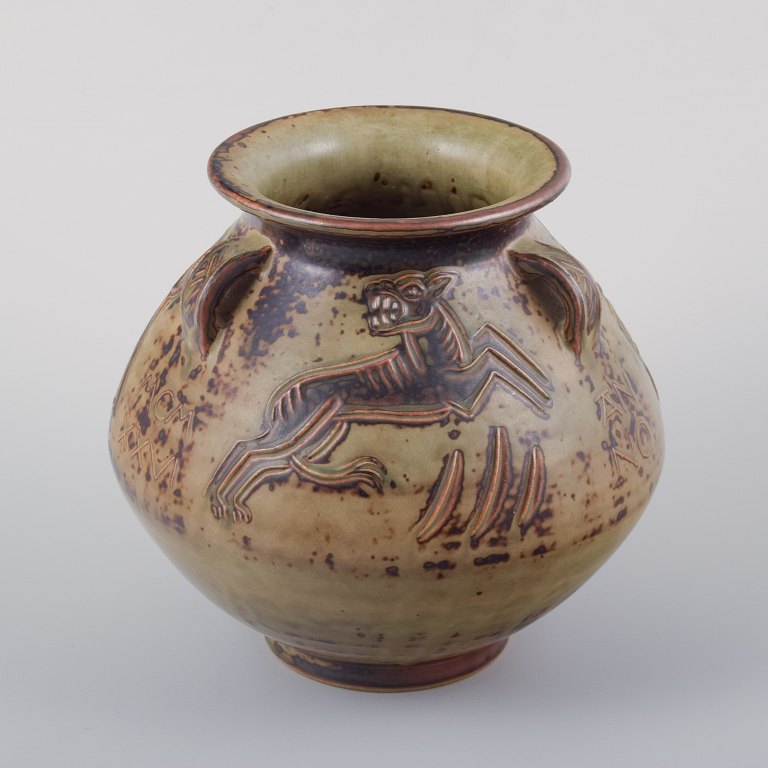 Jais Nielsen for Royal Copenhagen.Ceramic vase in sung glaze with religious motifs.