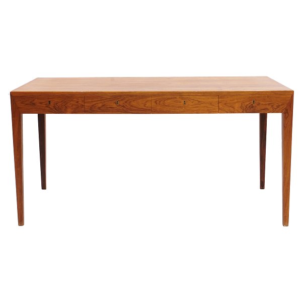 Rosewood veneered writing table by Severin Hansen, Denmark. Manufactured by 
Haslev Møbelsnedkeri. Nice condition. H: 72cm. Plate: 75x143cm