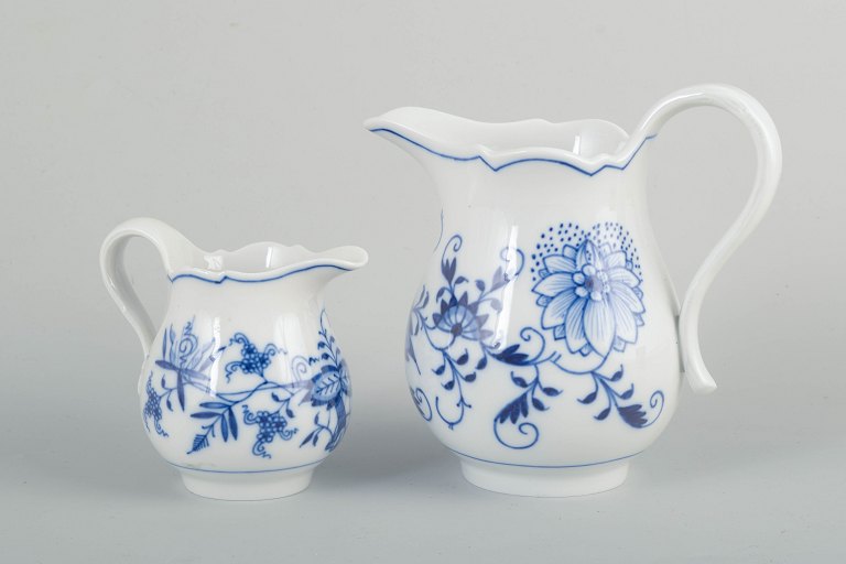 Meissen blue onionTwo creamers, early 20th century.