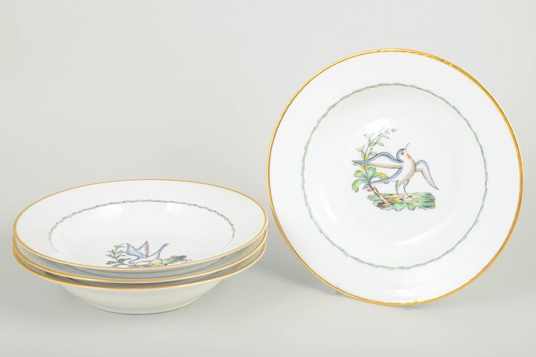 Royal Copenhagen – Set of four large deep plates, early 20th century.