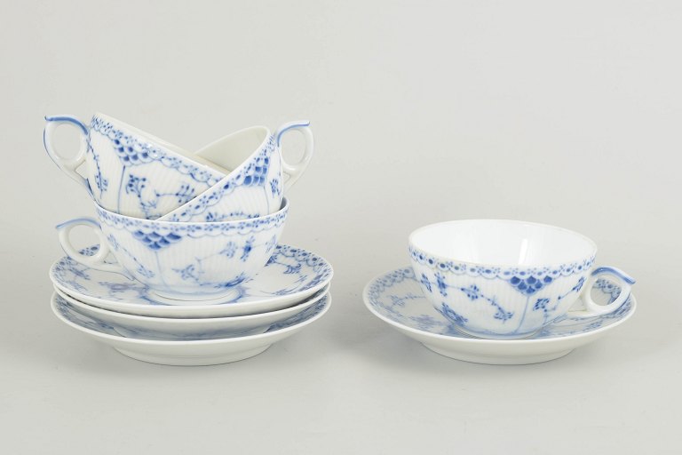 Royal CopenhagenBlue Fluted Half Lace teacups with saucers, set of 4, 1980s.