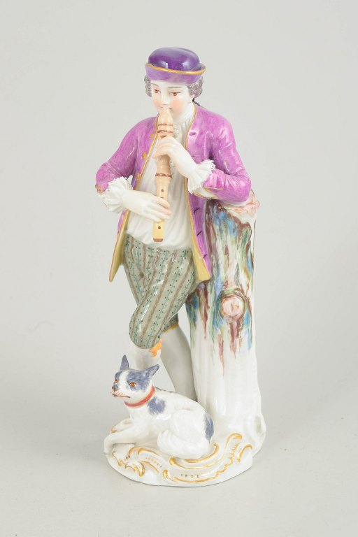 Meissen figurine, nobleman with flute and dog.