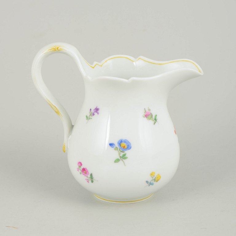 Meissen, large creamer with polychrome flower decoration.