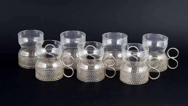Timo Sarpaneva for Iittala, set of seven tea glasses with holders.
