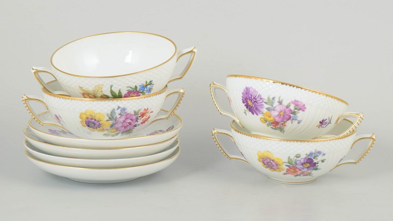 Royal Copenhagen Saxon flower, set of four bouillon cups with saucers.